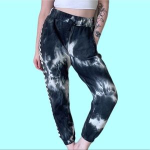 Tie dyed sweatpants with checkered print down the sides 🏁